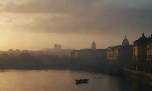 Paisaje urbano del siglo XVIII al amanecer con figuras de Iluminación en contemplación