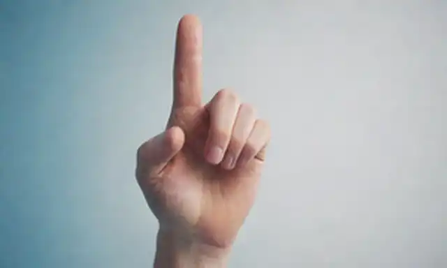 Una mano estilizada con el dedo índice extendido apuntando hacia arriba