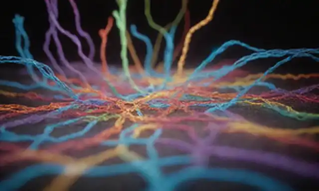 piezas de rompecabezas 3D conectadas por hilos brillantes, colores vibrantes, brechas entre neuronas cerebrales, formas abstractas fusionadas, formando una imagen completa, rodeadas de sutiles olas de luz